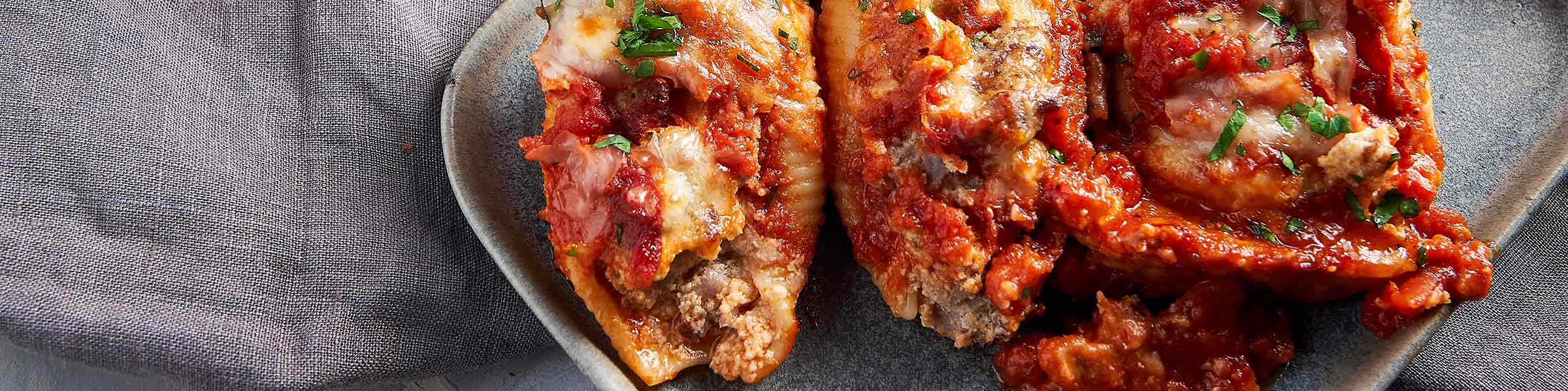 Three Cheese-Stuffed Shells with Meaty Tomato Sauce